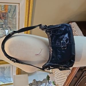 Blue patent leather handbag